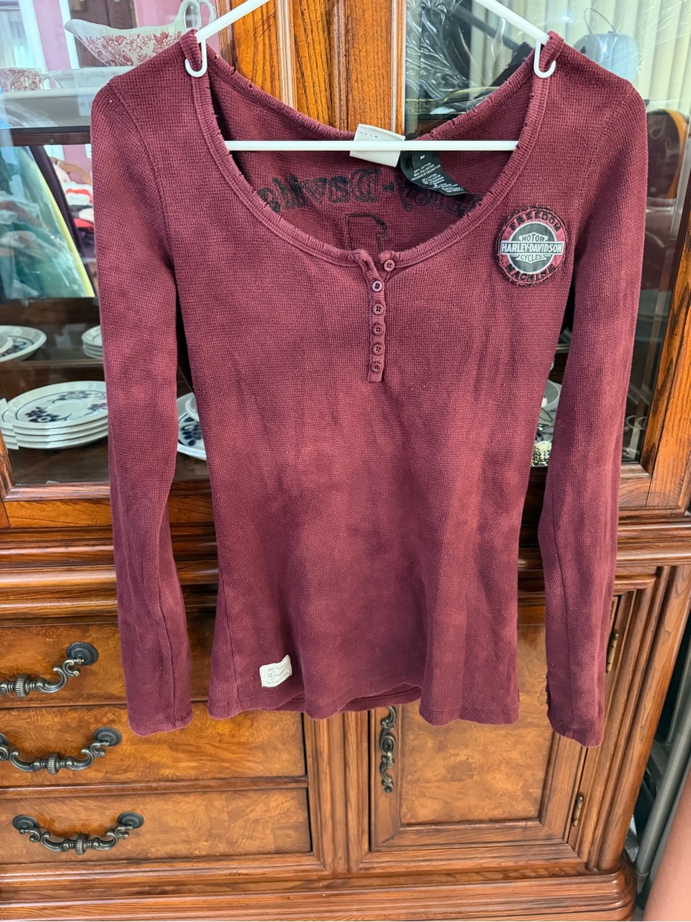 Vintage-style Harley Davidson long sleeve Henley thermal top faded burgundy.
